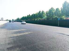一线丨金晶大道 齐新大道 人民路 改造工程一标段完成东半幅路面沥青下面层施工